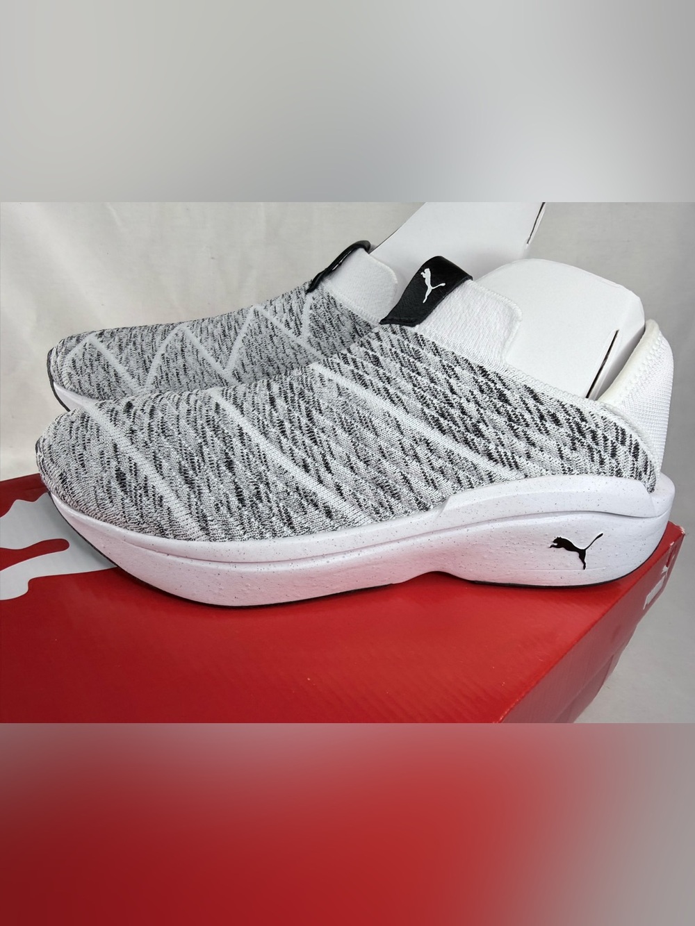 Puma Women’s Slip-On Knit Sneakers in White and Black